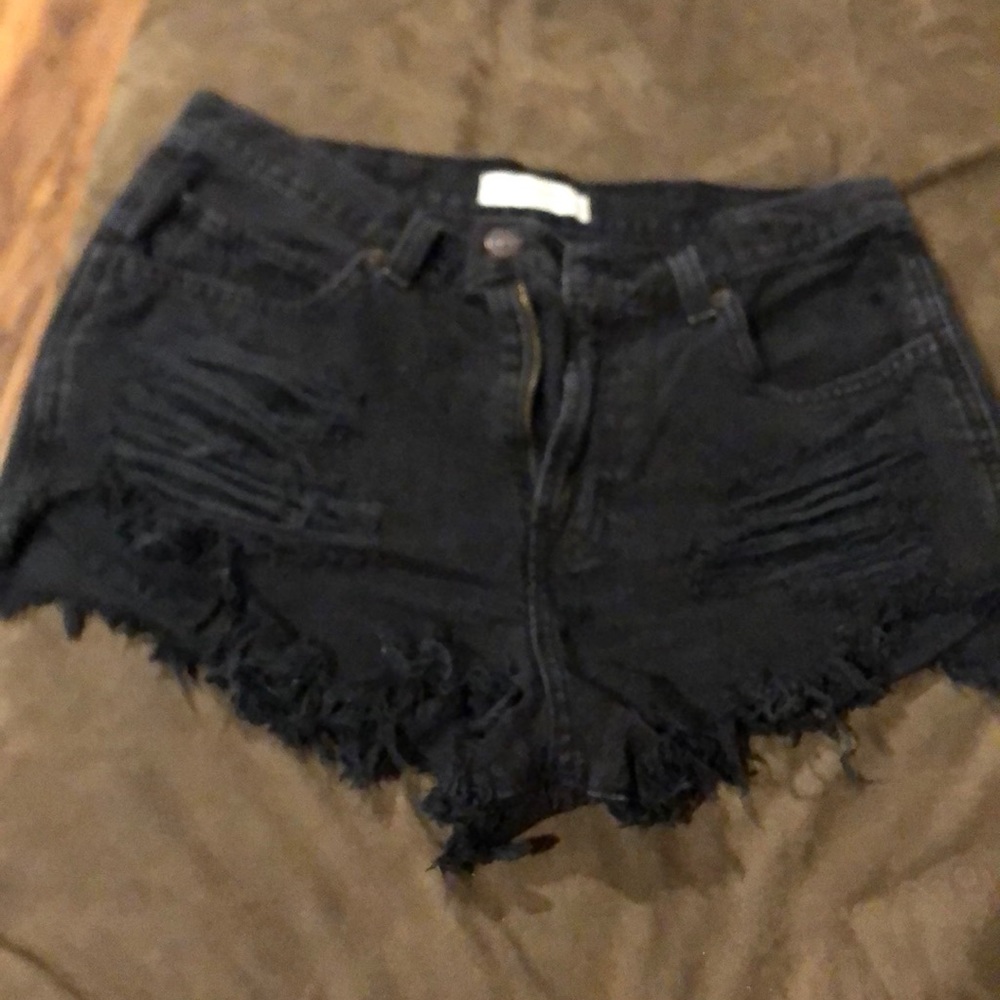 Black ripped shorts